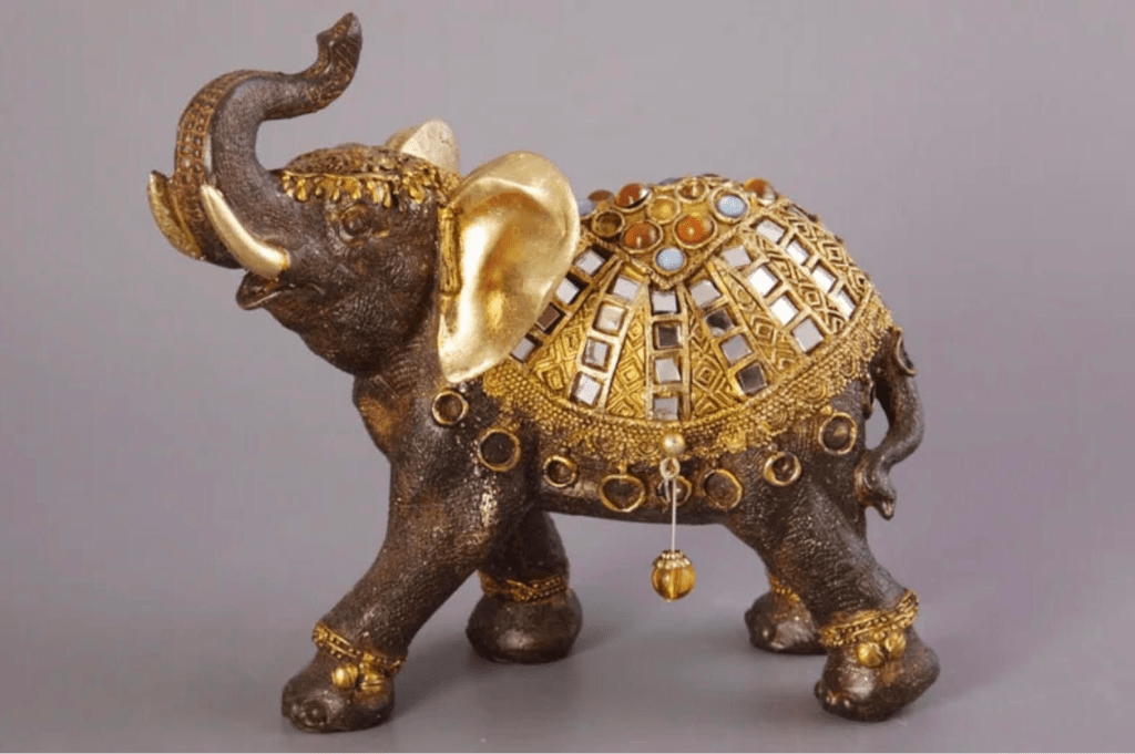 Символ слона значение. Статуэтка слон. Статуэтка "индийский слон". Слон фен шуй. Слон денежный талисман.
