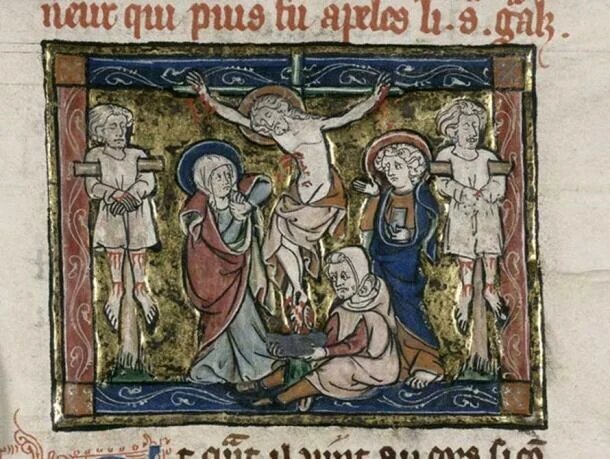 The Holy Grail is depicted as a cup into which the blood of Christ is collected. (British Library)