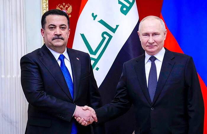    Мухаммед Судани и Владимир Путин.Iraqi Prime Minister's Media Office/Reuters