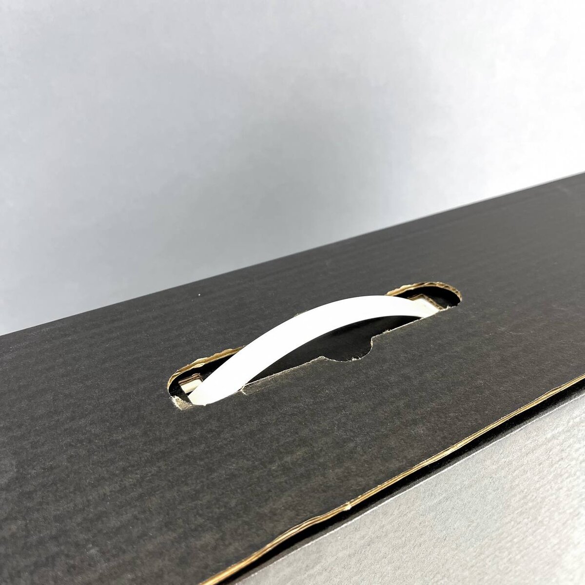 Упаковка из гофрокартона с ручкой от компании Антэк