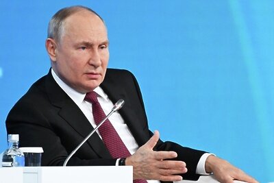    Президент РФ Владимир Путин на пленарном заседании Международного форума "Российская энергетическая неделя" в Центральном выставочном зале "Манеж" в Москве. ©Григорий Сысоев РИА Новости