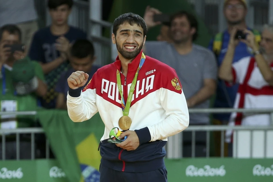 Хасан азларов. Хасан Халмурзаев Олимпийский чемпион. Хасан Халмурзаев дзюдо. Халмурзаев дзюдо Олимпийский чемпион. Олимпийский чемпион по дзюдо Хасан Халмурзаев.