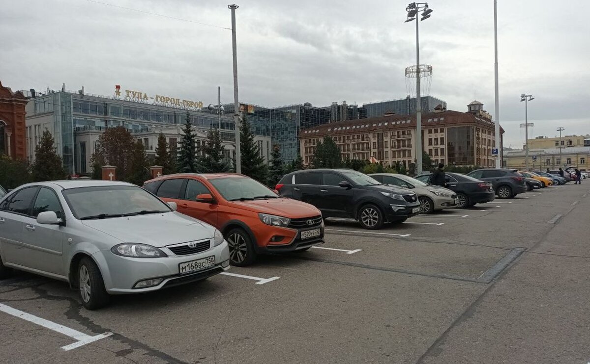 Николаева 59 парковка.