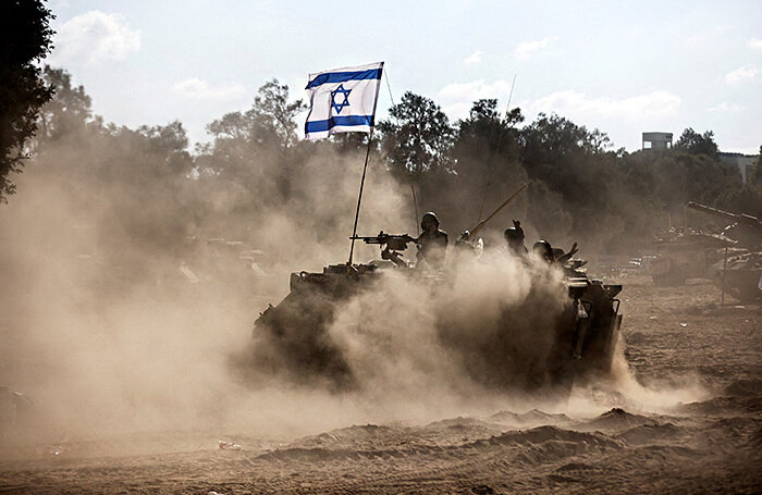    Военная техника у северной границы сектора Газа.Amir Cohen/EPA/TASS