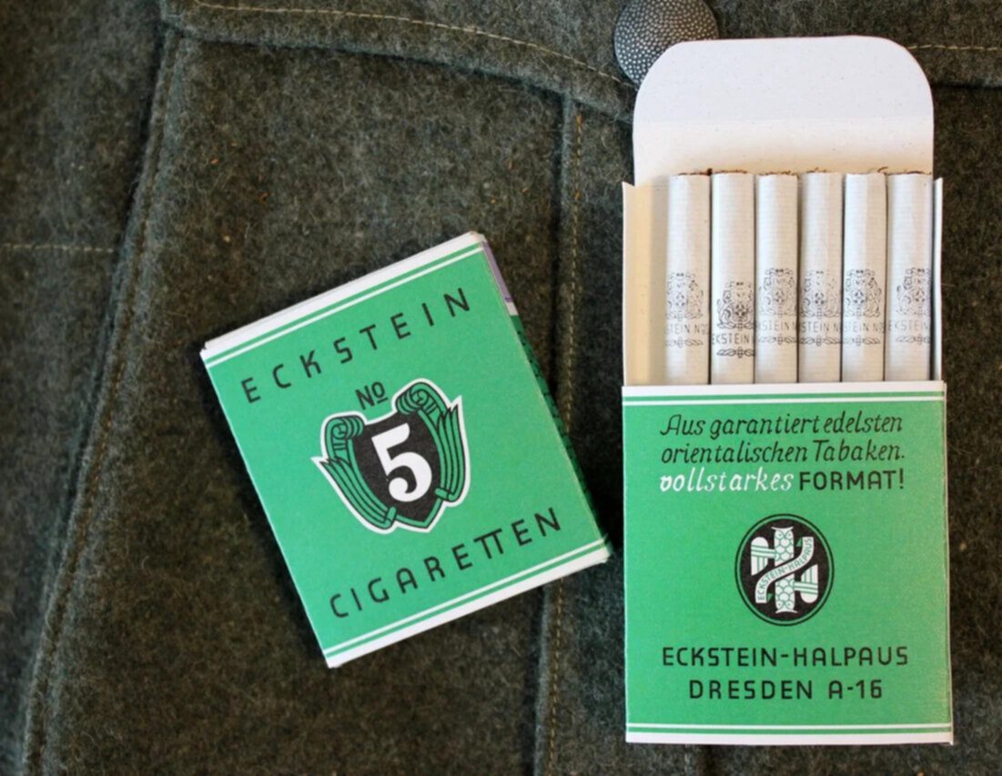 "№5". Были (есть) и другие "Экштейны". Есть большая вероятность того что это "реконструкция" тех старых сигарет. Хорошая (внешне) копия. Просто потому что слишком хорошо выглядят
