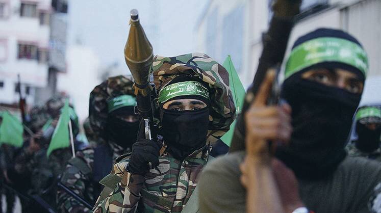    Ashraf Amra/APA Images via ZUMA Члены военного крыла исламистской организации ХАМАС в Газе