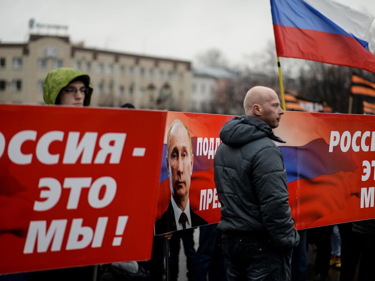    Плакат "Россия-это мы!"© РИА Новости / Константин Чалабов