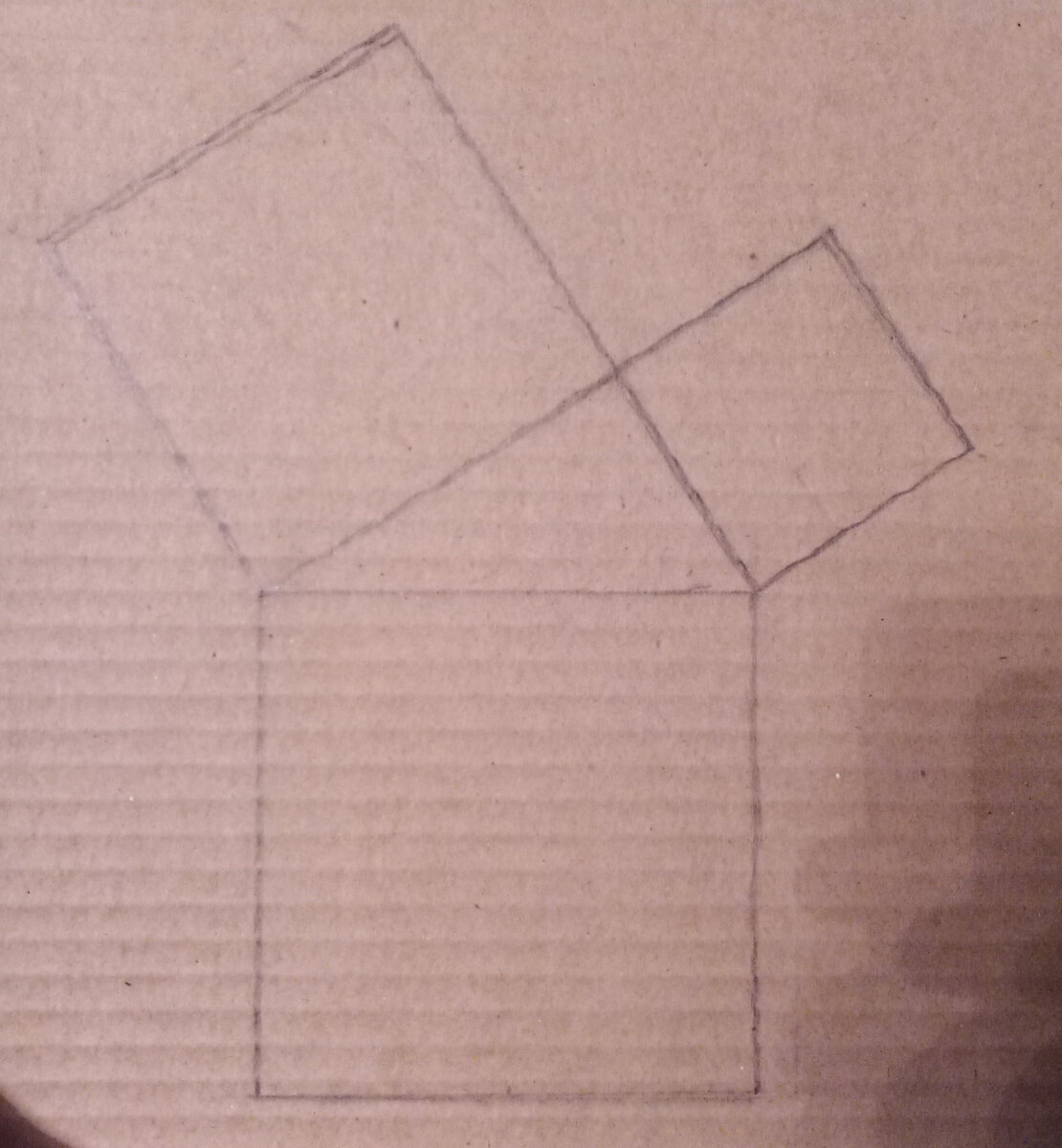 Размечаем 3 квадрата, отталкиваясь от сторон в нашем треугольнике, он – посредине (фото автора)