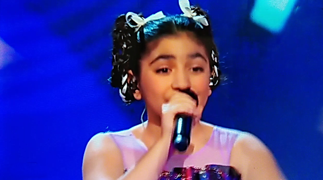 Кристина Тарасова. Фото: скриншот с экрана телевизора в обработке автора