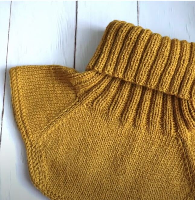    Манишка спицами   
Источник: Скриншот из видео