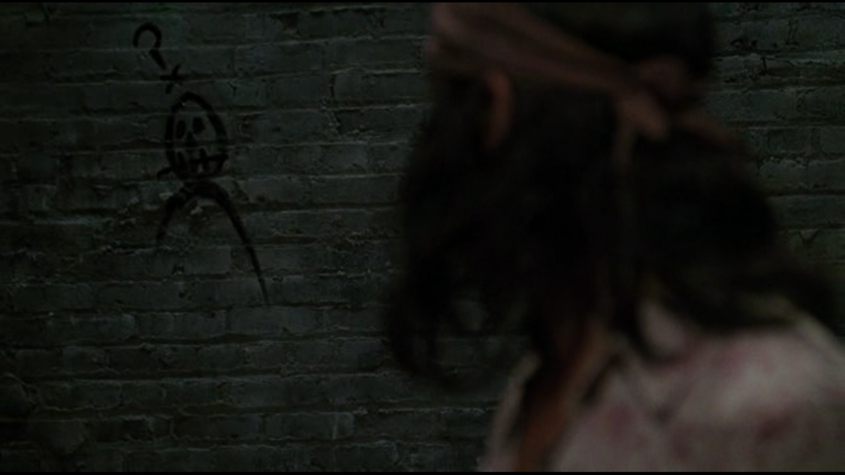 Второй раз этот знак появляется в коридоре, когда Ларри привёл Рафаэля к Маккарти