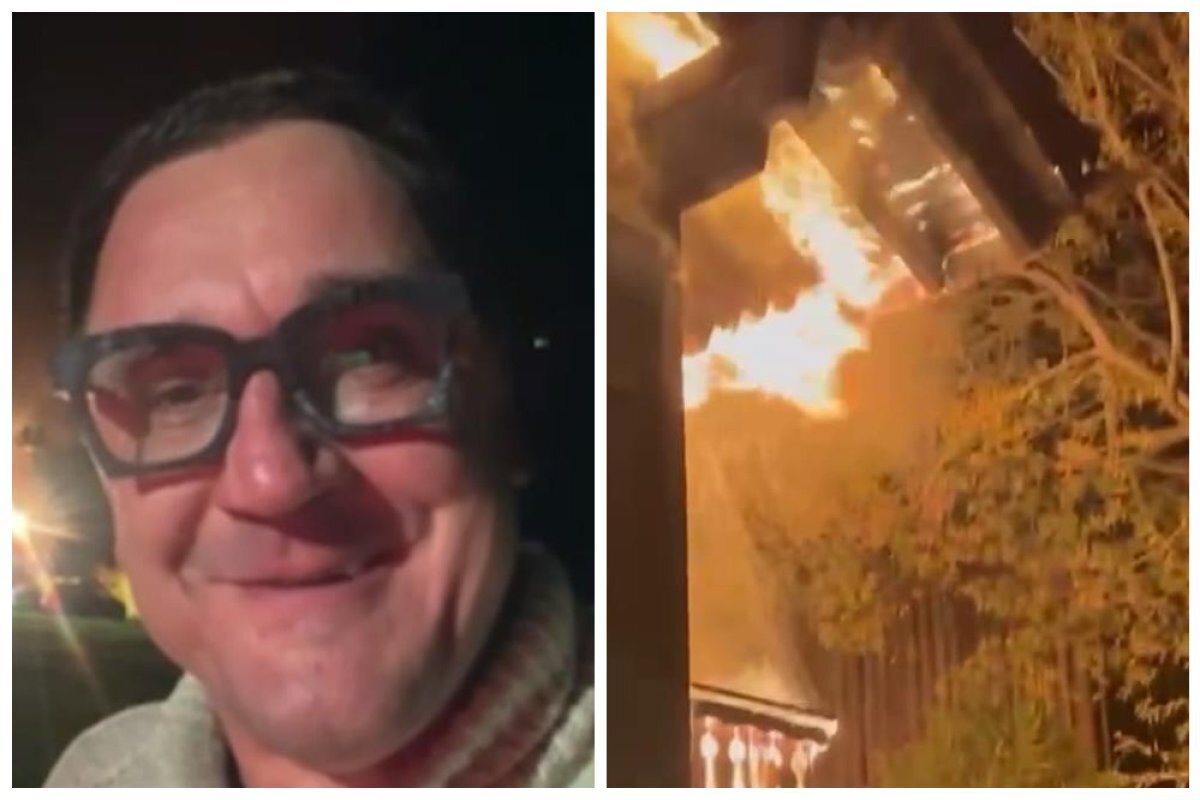    Блогер из Одессы Станислав Домбровский рядом со своим горящим домом в Швейцарии.
