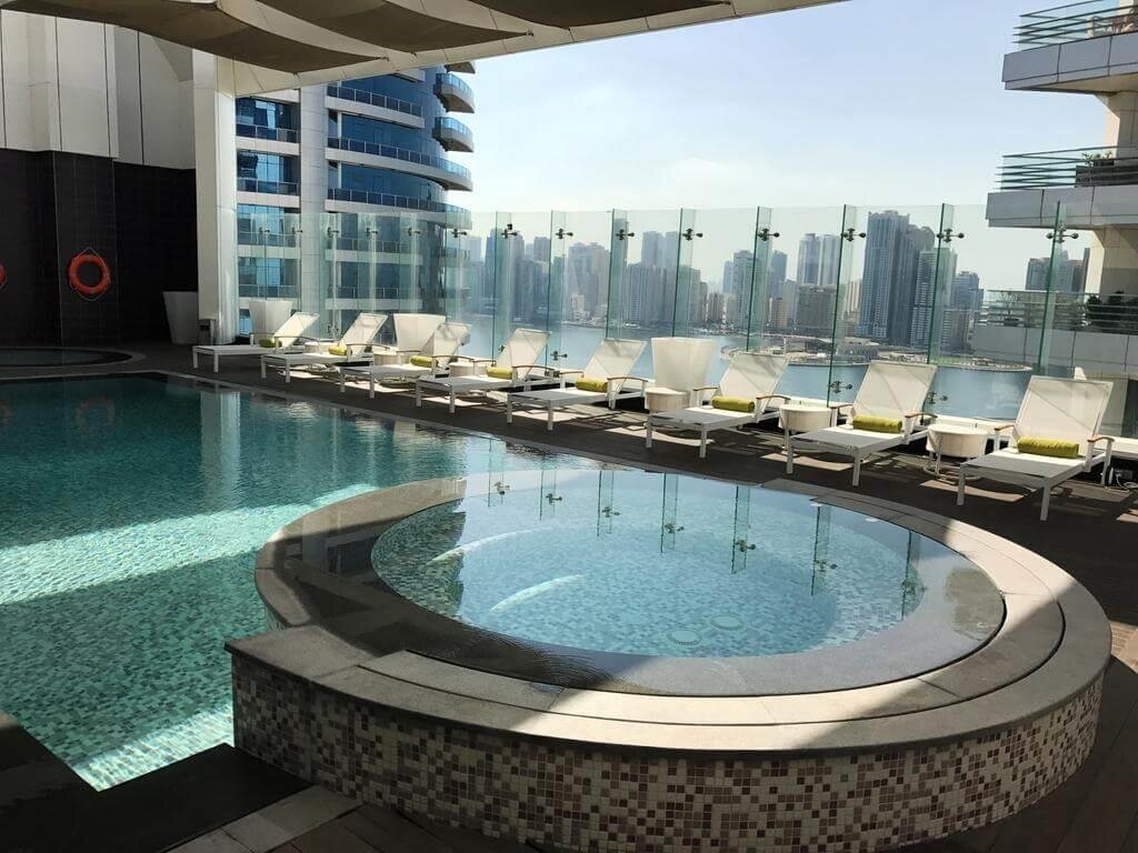Royal hotel sharjah оаэ. Шарджа Act Hotel. Рояль Тулип Шарджа. The Act Hotel 5*. Pullman Hotel Sharjah 5.