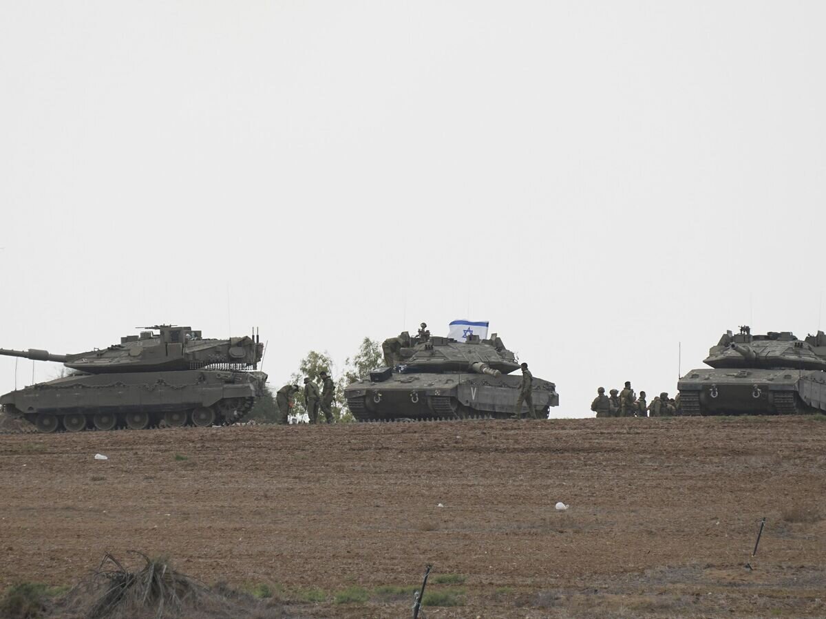    Израильские военные в районе границы с сектором Газа© AP Photo / Ohad Zwigenberg