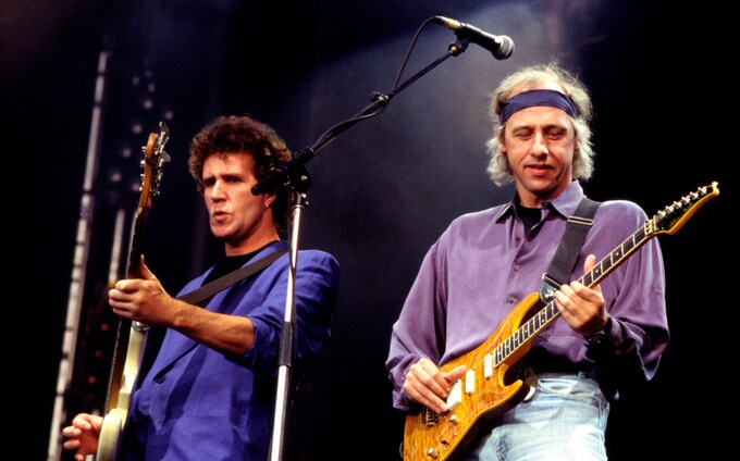 Джон Иллсли и Марк Нопфлер из группы Dire Straits в 1980-х годах 