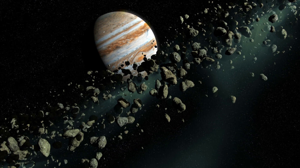 Пояс астероидов  на фоне Юпитера