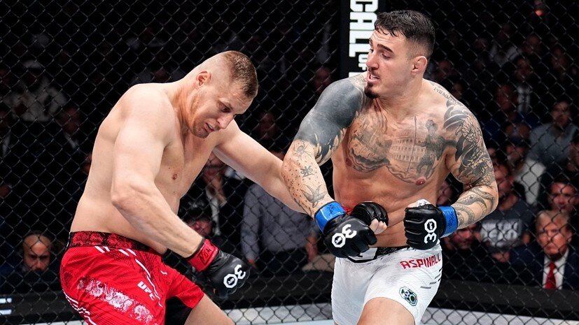     Бойцы UFC Сергей Павлович и Том Аспинэлл Gettyimages.ru Chris Unger / Contributor
