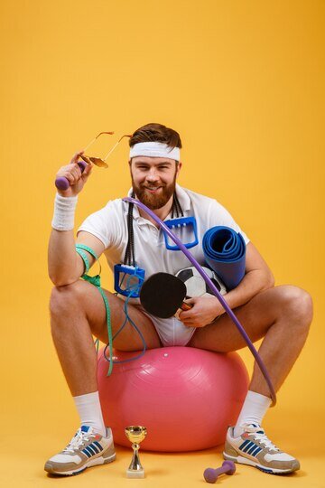https://www.freepik.com/free-photo/portrait-sports-man-sitting-fitness-ball_7855374.htm