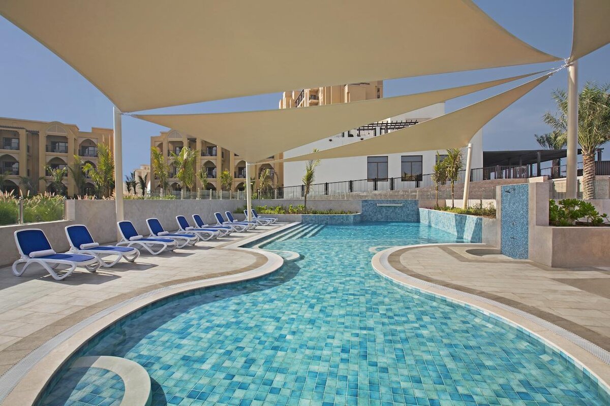 Radisson resort ras al оаэ. DOUBLETREE by Hilton Resort & Spa Marjan Island. DOUBLETREE by Hilton Resort Spa Marjan Island 5 ОАЭ. DOUBLETREE by Hilton Resort Spa 5. DOUBLETREE by Hilton Marjan Island Resort Spa рас-Эль-Хайма