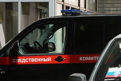    Автомобиль следственного комитета РФ у здания Главного следственного управления Следственного комитета РФ по Москве. ©Михаил Воскресенский РИА Новости