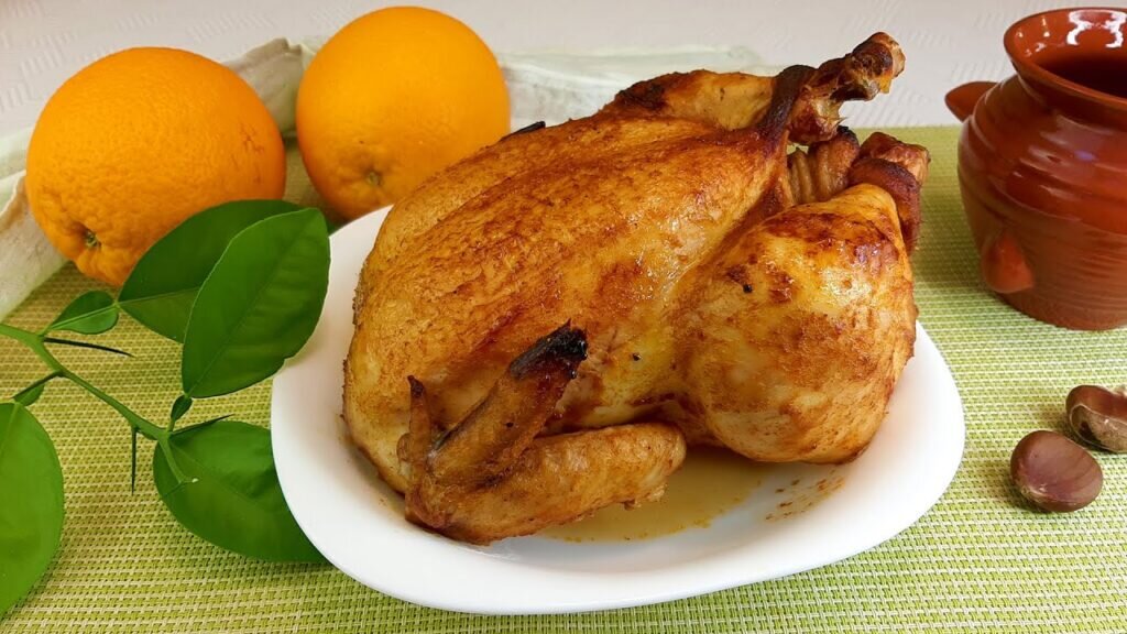 Курица с апельсином на сковороде