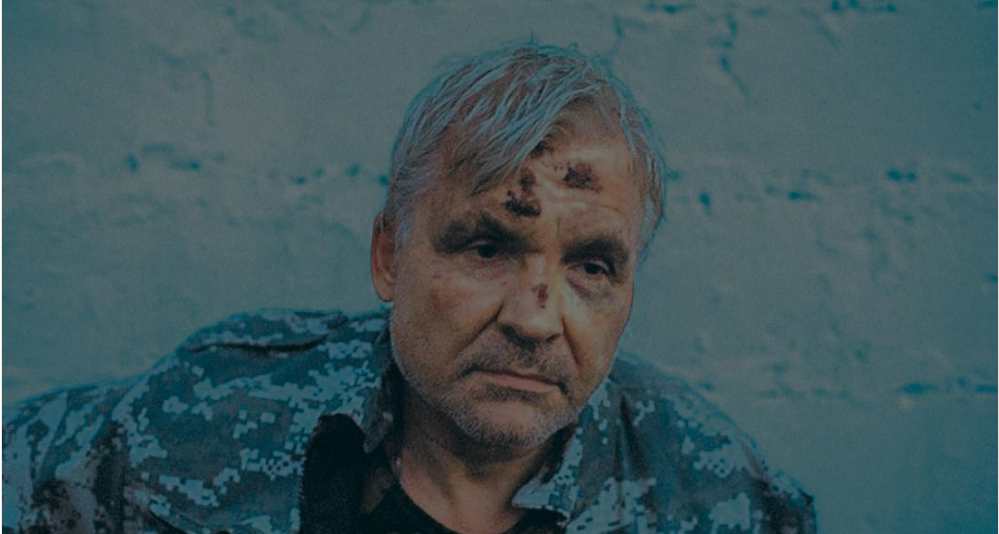 Юрий Юрченко - писатель. На фото ополченец Юрий Юрченко после освобождения из плена ВСУ