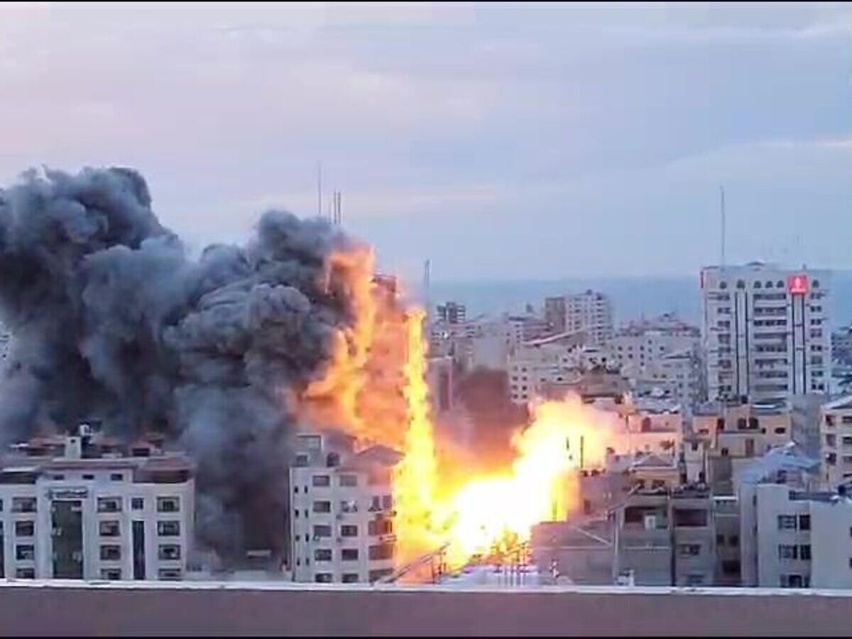    Обстрел зданий в палестинском городе Газа© РИА Новости / Тарек Алиян