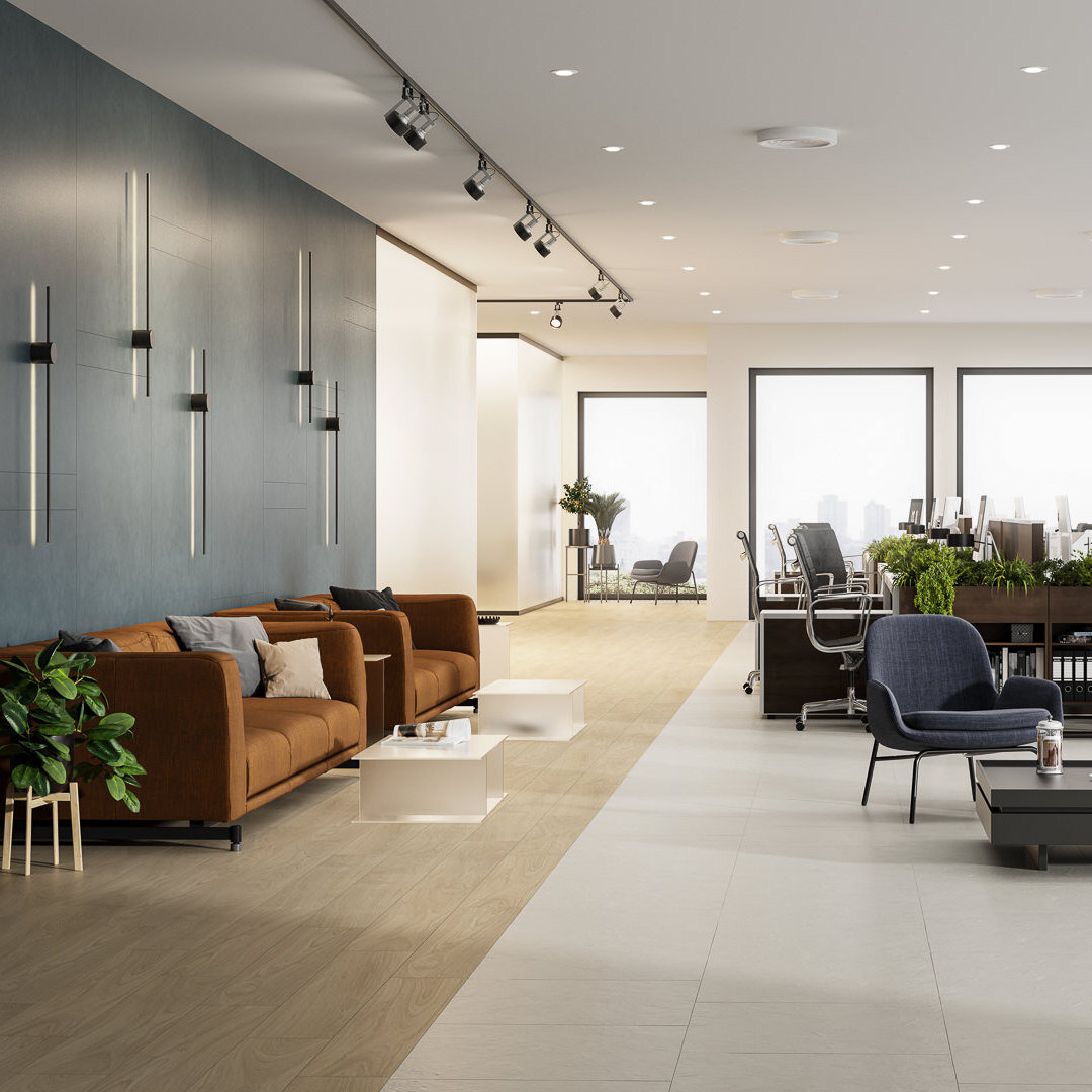 В просторной гостиной в скандинавском стиле можно использовать покрытия из керамического гранита бежевых и темно-синих оттенков, например «Про Чементо».