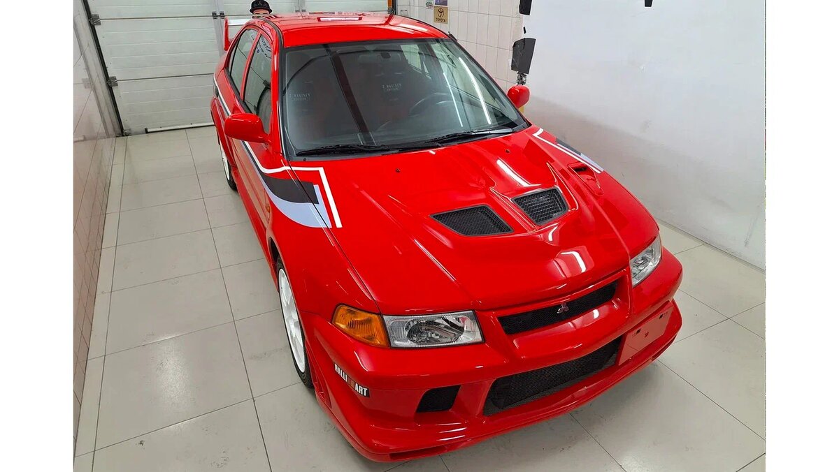 Mitsubishi Lancer Evolution TME. Mitsubishi Lancer Evolution vi Hugo 2000.