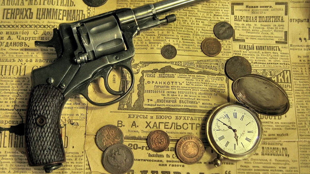 https://www.goodfon.ru/weapon/wallpaper-download-1920x1080-nagan-revolver-gazeta-antikvariat-monety-karmannye-chasy-ist.html