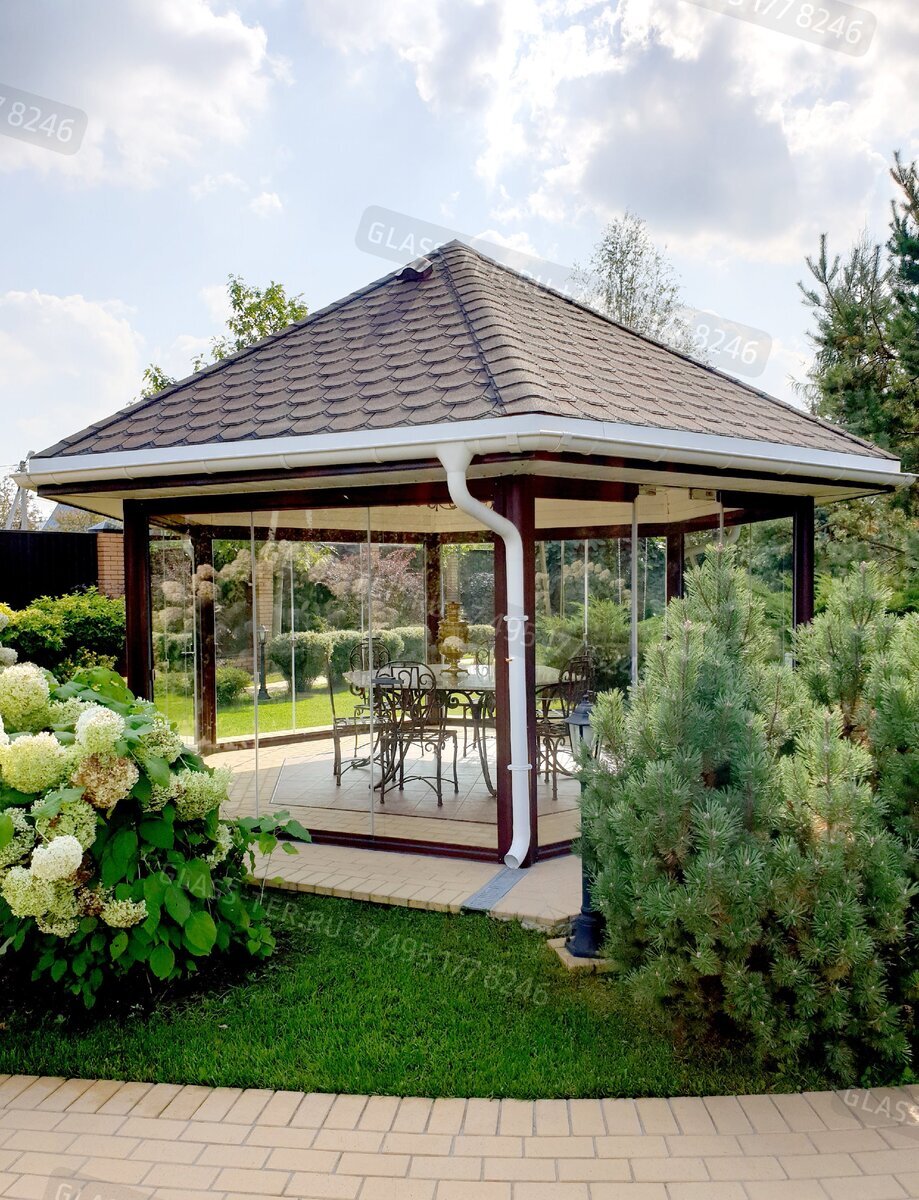 Остекление беседки раздвижным стеклом. Проект выполнен Интерьер Холдинг ООО