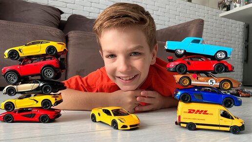 Mark and 11 new Kinsmart diecast cars from different countries