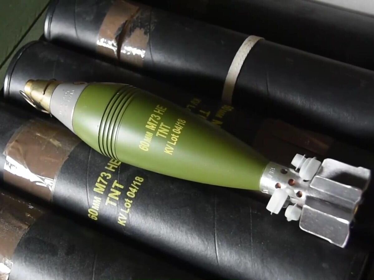    Ящик с минометными снарядами M73 HE калибром 60 мм на складе ВСУ в Харьковской области© РИА Новости / Пресс-служба Минобороны РФ