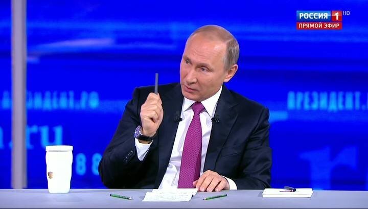 Владимир Путин, отвечающий на вопросы в прямом эфире. Стоп-кадр трансляции