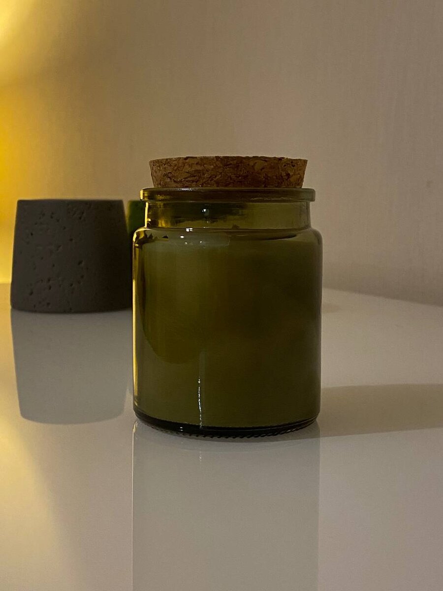 Фото автора канала. Свеча в стеклянной баночке.