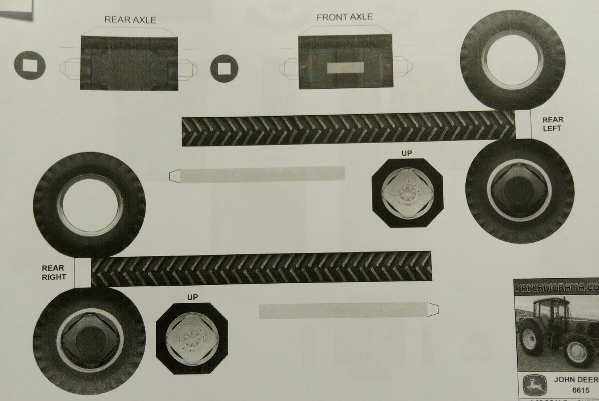 Первый листа развертки модели из бумаги трактора John Deere 6615. Личное фото.