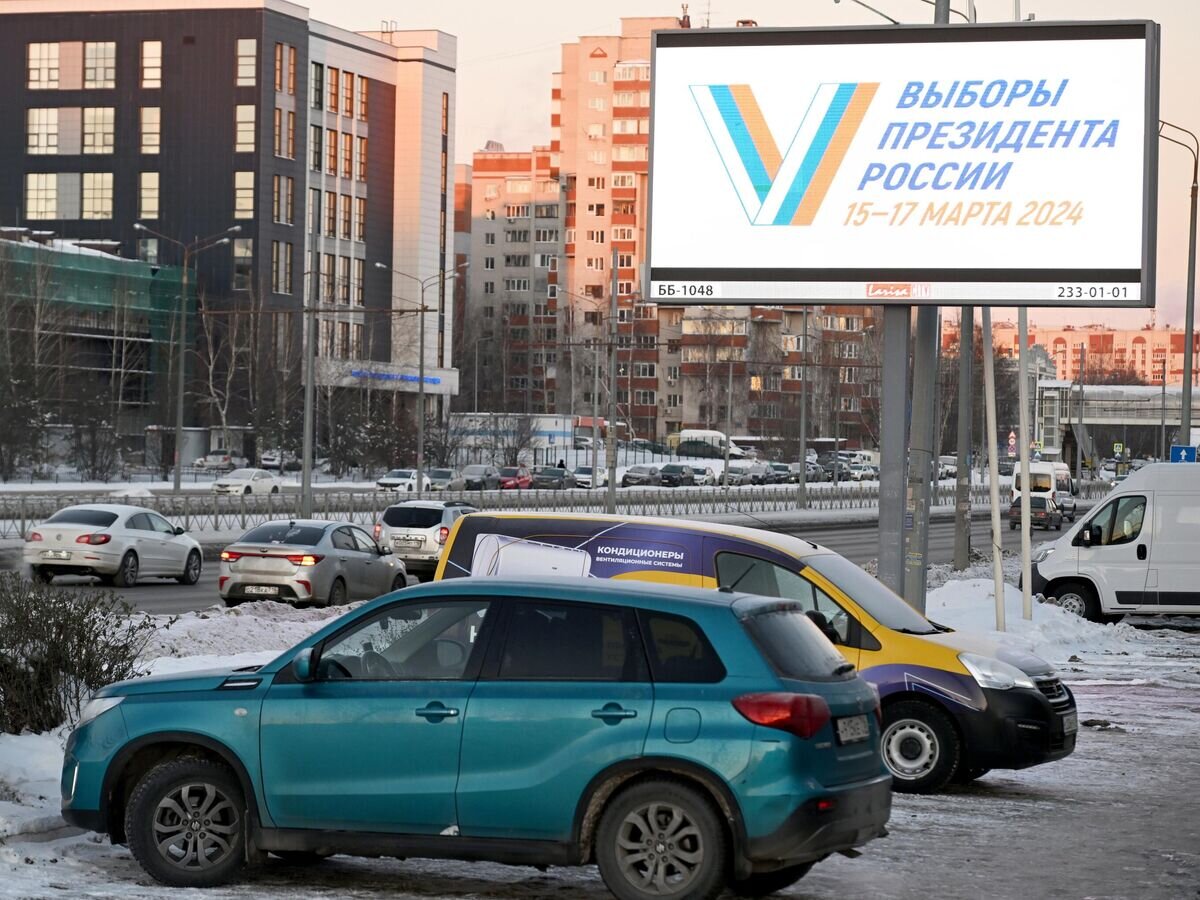    Агитационный предвыборный билборд на одной из улиц в Казани© РИА Новости / Максим Богодвид