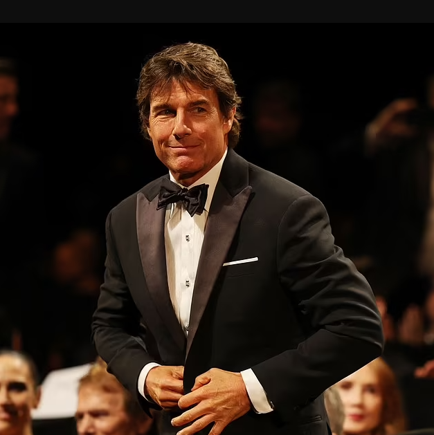 RICHARD EDEN: Tom Cruise, 61, was spotted canoodling at a party in London 's Mayfair with a Russian socialite