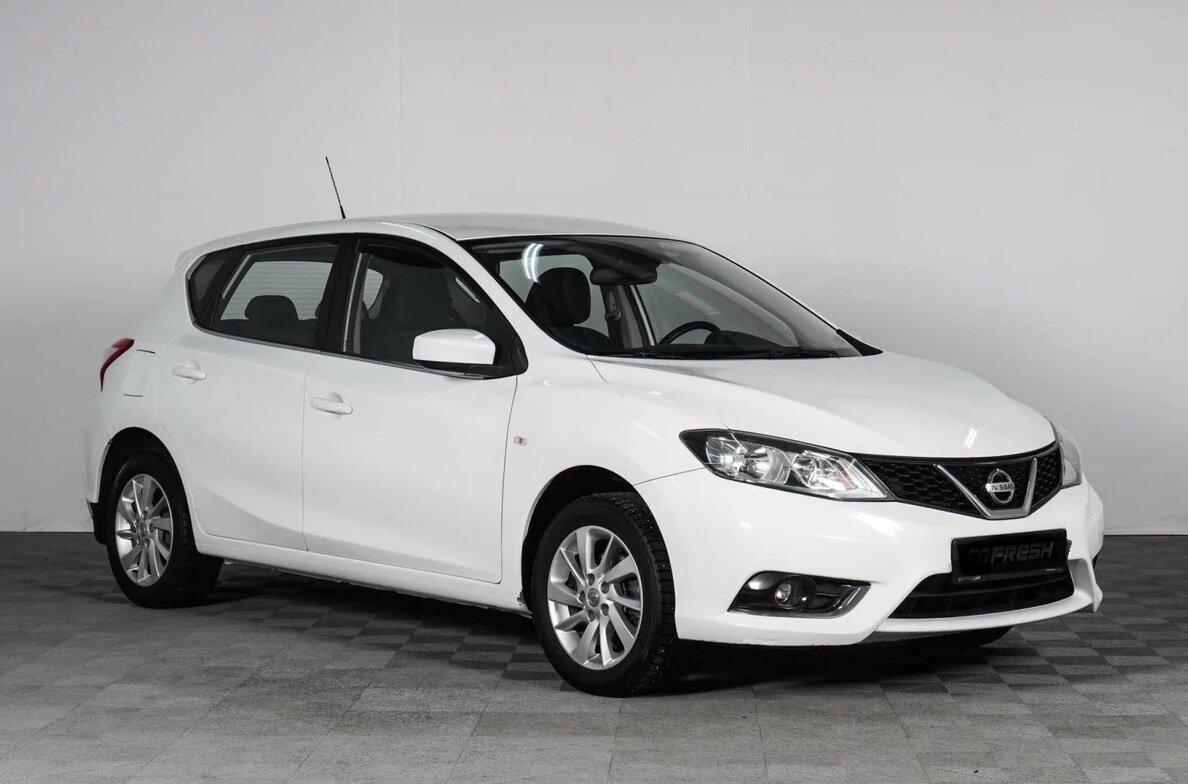 Ниссан Тиида.