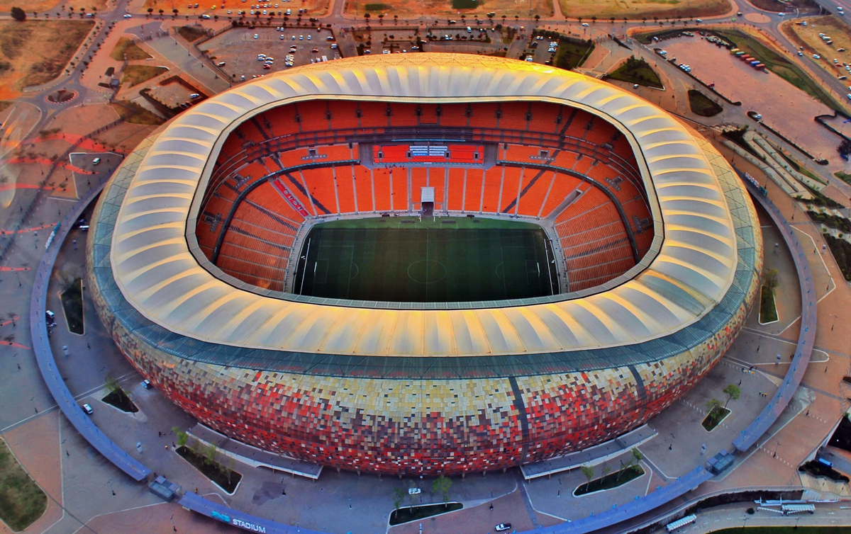 Самый большой по вместимости стадион в мире. Йоханнесбург стадион. СОККЕР Сити стадион. ЮАР стадион. First National Bank Stadium.