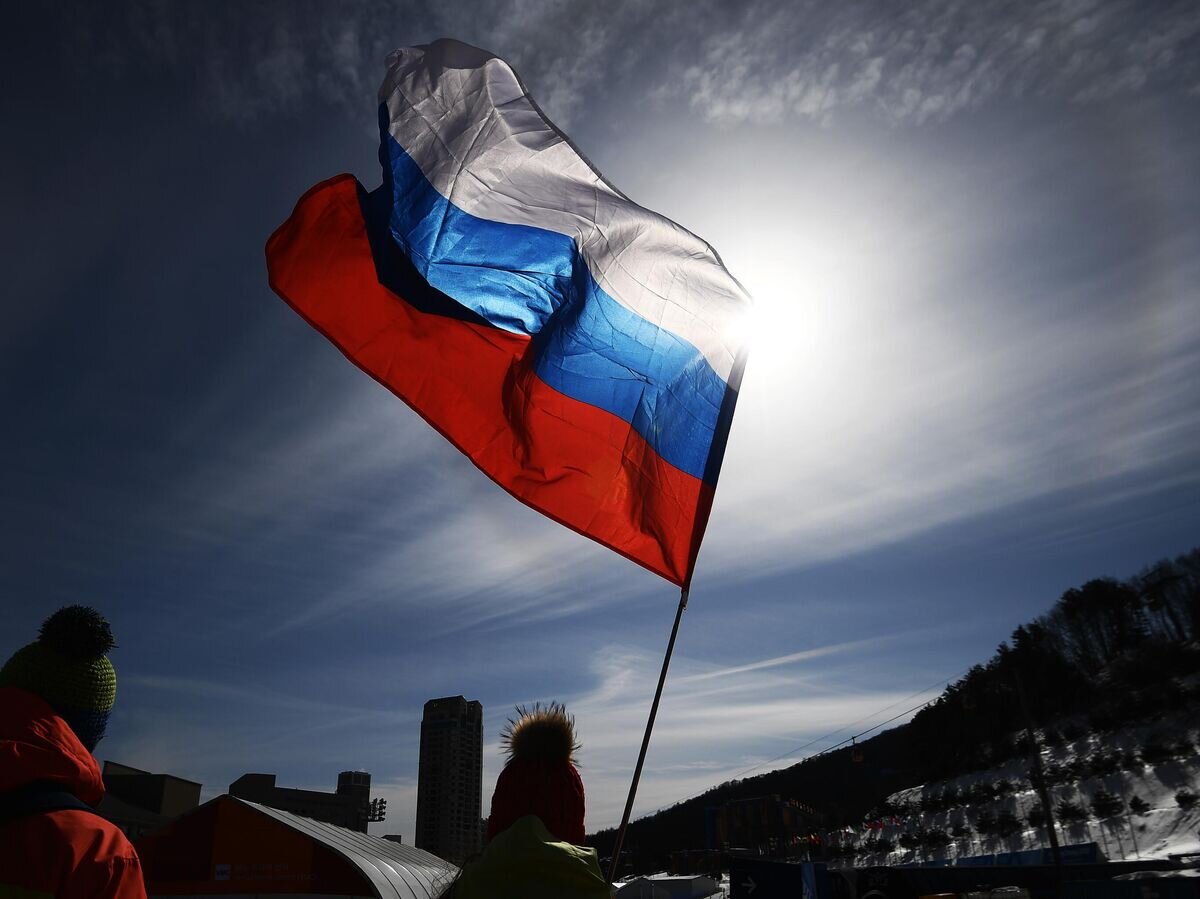 Российский флаг © РИА Новости / Рамиль Ситдиков