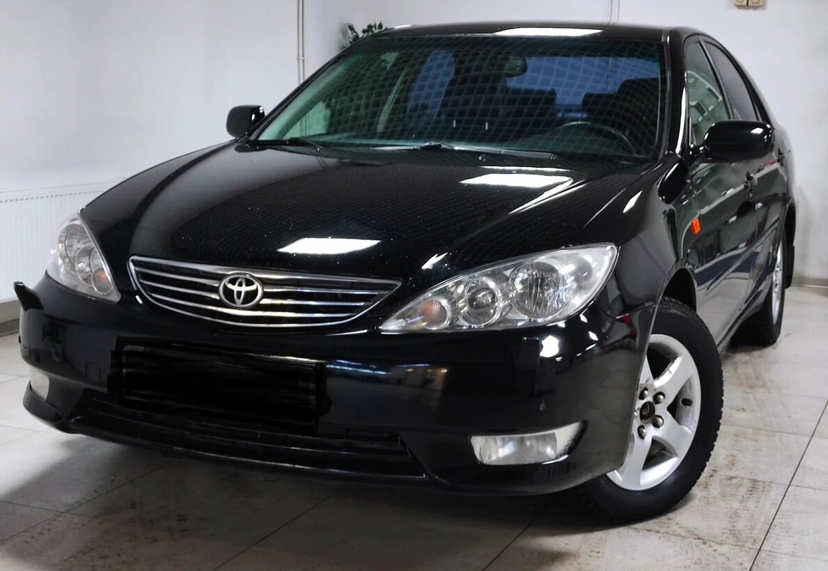 Тойота Камри.