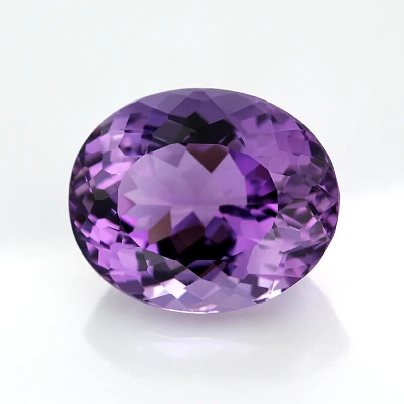 Аметист поделочный камень. Фиалковый аметист. Пурпурный аметист. Фиалковый аметист камень. Маджорит фиолетовый гранат.