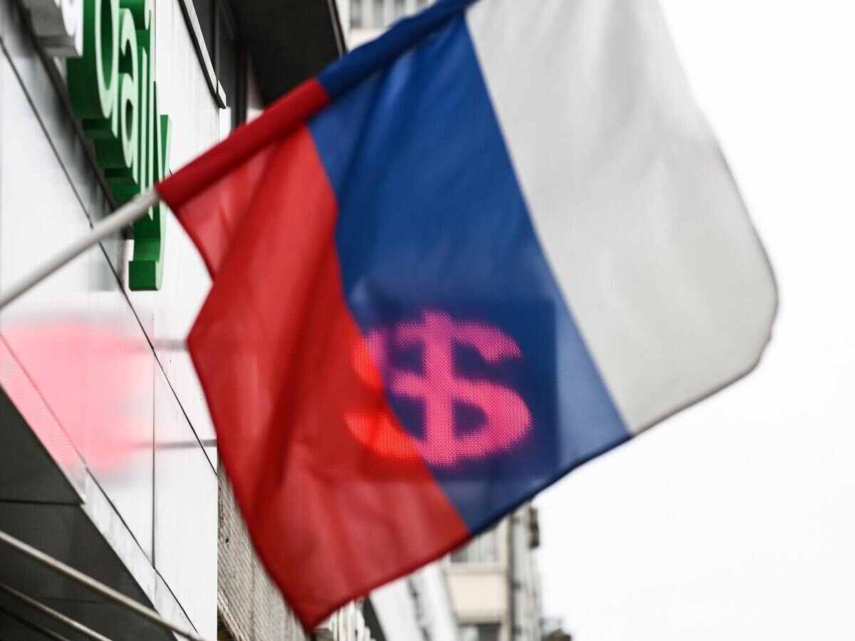    Знак доллара на одном из пунктов обмена валют в Москве© РИА Новости / Владимир Астапкович