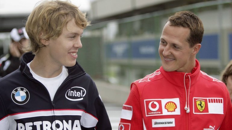    Себастьян Феттель и Михаэль Шумахер. Global Look Press