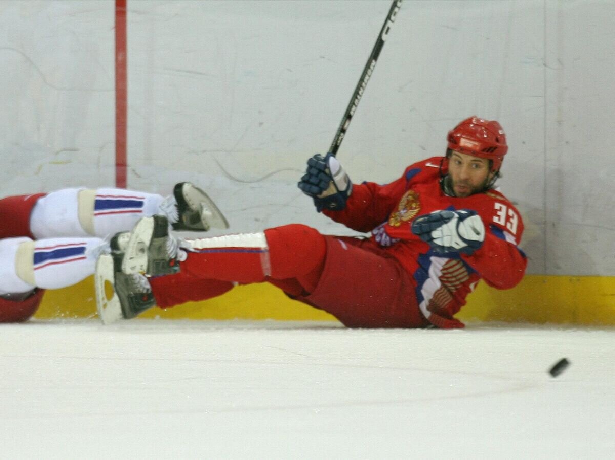    Максим Сушинский (справа) на Олимпийских играх 2006 года© AFP 2023 / FILIPPO MONTEFORTE