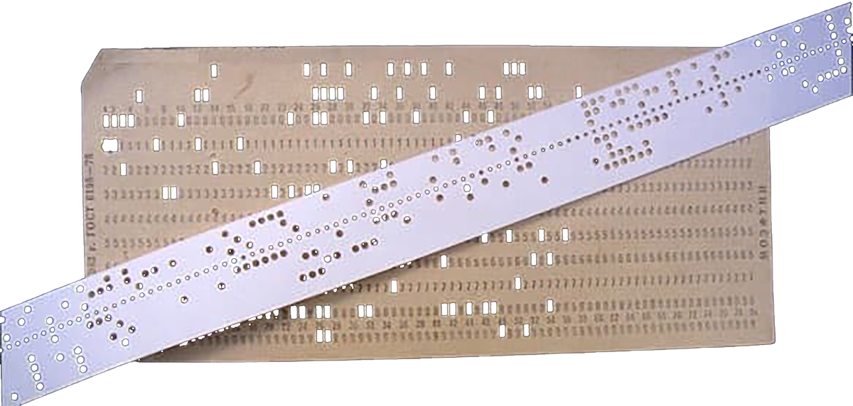 Перфокарта (СССР) и фрагмент перфоленты, на которой записан перемещающий ассемблер (у меня есть весь рулон).