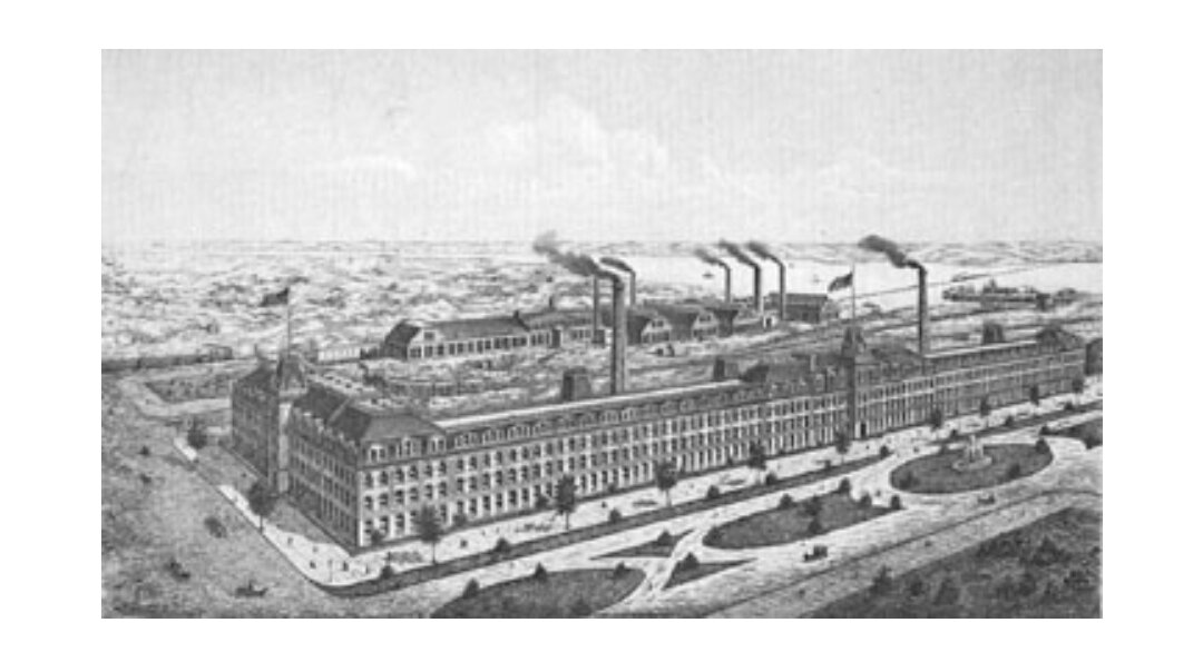 В 1873 году компания по производству швейных машин Singer приобрела 32 акра на этом участке и основала фабрику , на которой будут производить культовые машины на протяжении более столетия