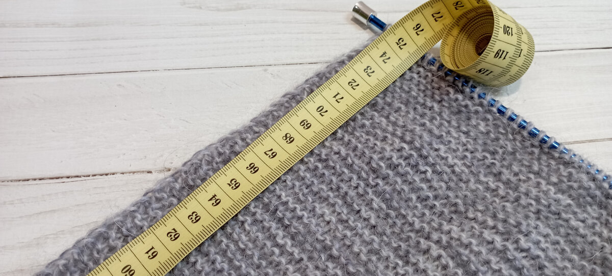 Это длина косынки по прямой линии.