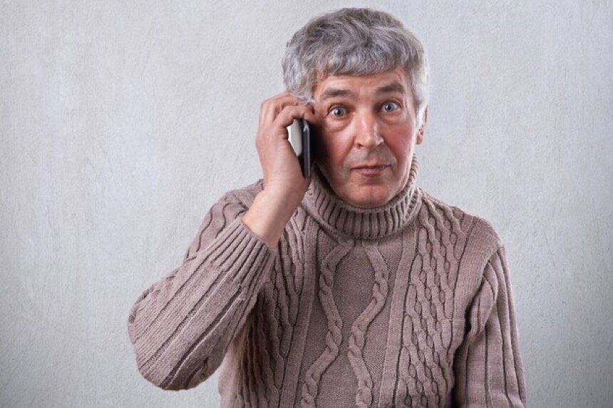 https://img.freepik.com/premium-photo/a-surprised-elderly-man-in-sweater-having-gray-hair-round-dark-eyes-and-wrinkles-on-his-face-communicating-over-the-telephone_176532-5902.jpg